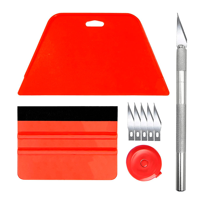Set, completo di accessori per l'installazione di adesivi murali